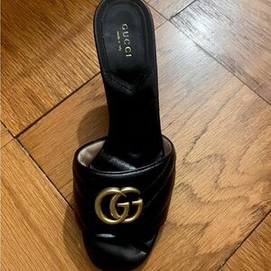 Gucci Black and Gold Mules with GG Logo